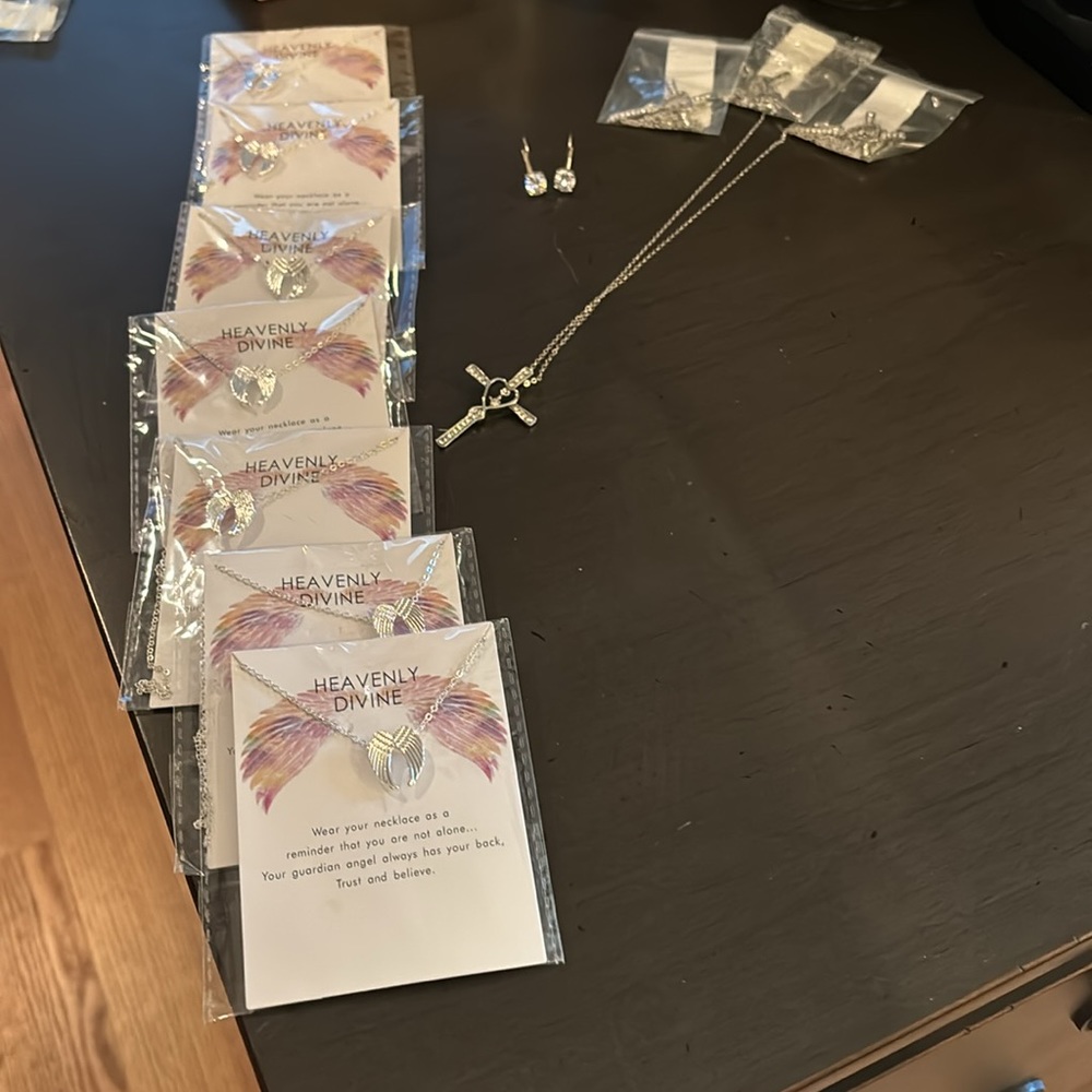 Jewelry silver 12 pieces. Brand new sold all together. 11 necklaces 1 earrings